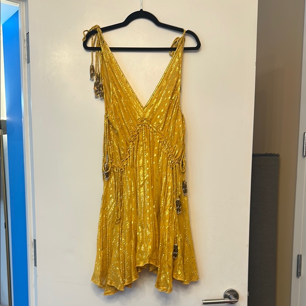 Yellow Sleeveless Dress with Tassels